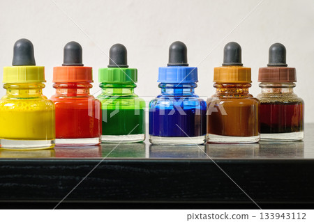 Indoor. Small bottles of colored watercolors Indoor. Small bottles of colored watercolors 133943112