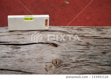 Outdoor. small spirit level on wood Outdoor. small spirit level on wood 133943126