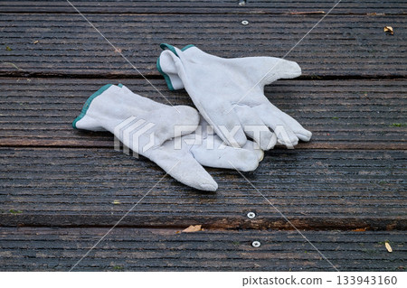 Work gloves on wooden slats Work gloves on wooden slats 133943160