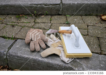 Work gloves on wooden slats Work gloves on wooden slats 133943166