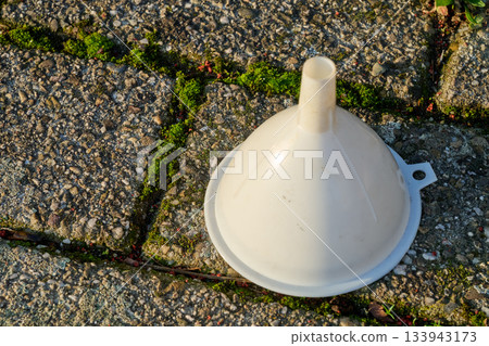 funnel on the cobblestone floor funnel on the cobblestone floor 133943173