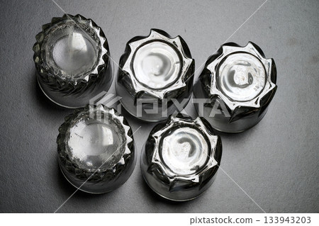Water glass upside down on the table Water glass upside down on the table 133943203