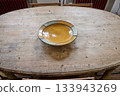 ovale interior table and empty salad bowl 133943269