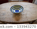 ovale interior table and empty salad bowl 133943270