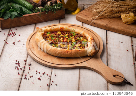 Khachapuri with minced meat filling Khachapuri with minced meat filling 133943846