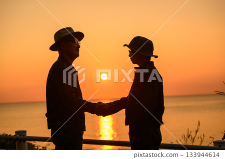 Senior men shaking hands Senior men shaking hands 133944614