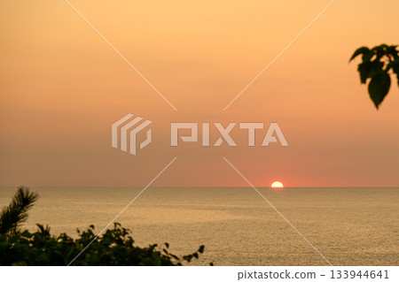 Sunset over the sea 133944641