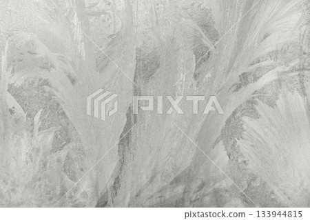 Abstract icy textures form a serene, frosted landscape in soft gray tones. Demonstration Color of the Year 2026. Abstract icy textures form a serene, frosted landscape in soft gray tones. Demonstration Color of the Year 2026. 133944815