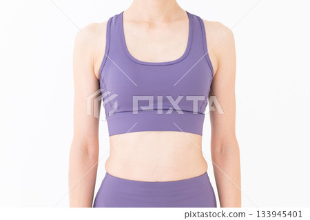 Middle-aged woman in yoga wear Middle-aged woman in yoga wear 133945401