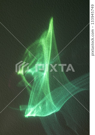 Green light abstract ribbons create ethereal neon waves for modern design and decor Green light abstract ribbons create ethereal neon waves for modern design and decor 133945749