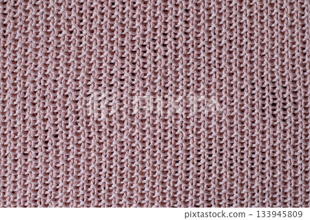 Soft pink knitted fabric texture with woven pattern for background use 133945809