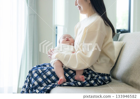Newborn to be held by mother Newborn to be held by mother 133946582