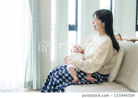 Newborn to be held by mother Newborn to be held by mother 133946584