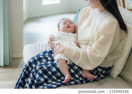 Newborn to be held by mother Newborn to be held by mother 133946586