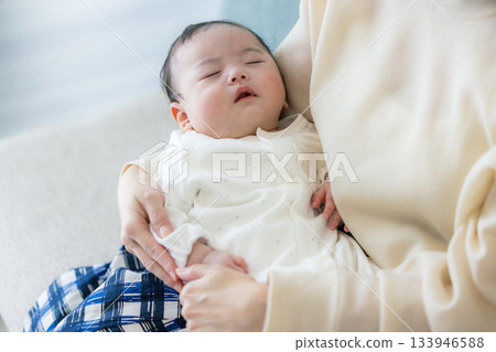 Newborn to be held by mother 133946588