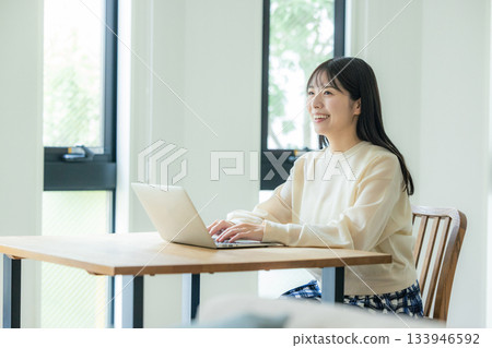 Woman working at home Woman working at home 133946592