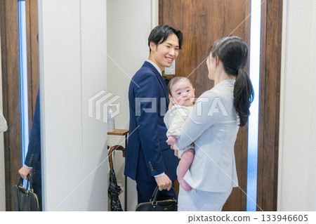 Baby and working couple Baby and working couple 133946605