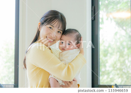 Mother raising a child Mother raising a child 133946659