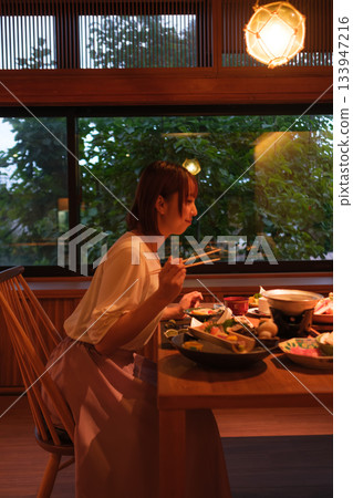 Dinner time at the inn | Relaxing by the window while eating Dinner time at the inn | Relaxing by the window while eating 133947216