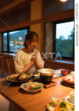Dinner time at the inn | Relaxing by the window while eating Dinner time at the inn | Relaxing by the window while eating 133947220