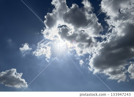 sun shining through clouds sun shining through clouds 133947243