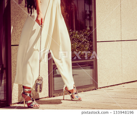 Silver high heels, purse and culottes Silver high heels, purse and culottes 133948196