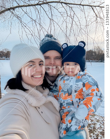 Happy Family Enjoying a Winter Day Happy Family Enjoying a Winter Day 133948813