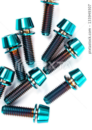 Blue titanium hexagonal bolts on a white background 133949307