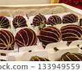 Decorative velvet ornaments ready for festive holiday celebrations 133949559