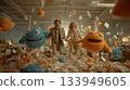 Adults joyfully tossing colorful plush toys in a lively open space 133949605