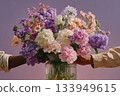 Creating a beautiful flower arrangement with vibrant blooms and joyful hands 133949615