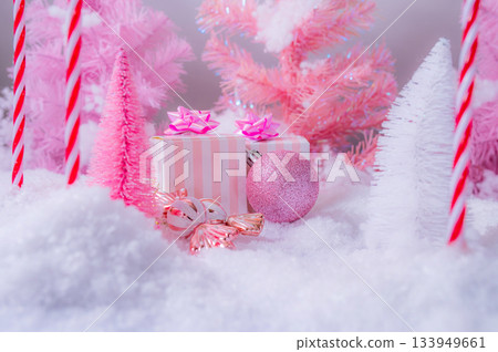 Pink Christmas Holiday Scene with Gifts Candy and Frosted Trees Pink Christmas Holiday Scene with Gifts Candy and Frosted Trees 133949661