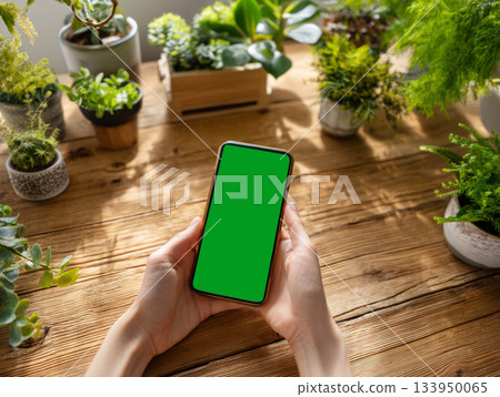 Smartphone mockup in green eco workspace Smartphone mockup in green eco workspace 133950065