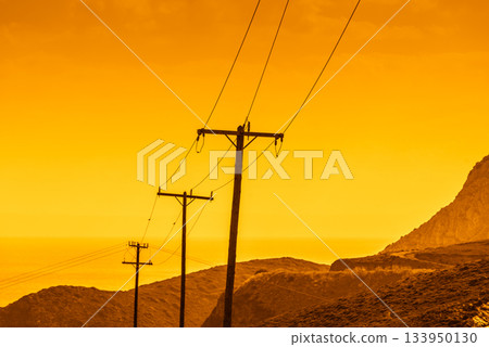 High voltage towers in mountains 133950130