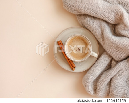 Hot coffee with scarf and cinnamon Hot coffee with scarf and cinnamon 133950159