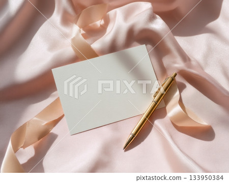 Blank card and gold pen on silk Blank card and gold pen on silk 133950384