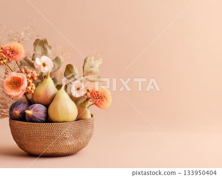 Pears and figs in basket with dry flowers Pears and figs in basket with dry flowers 133950404