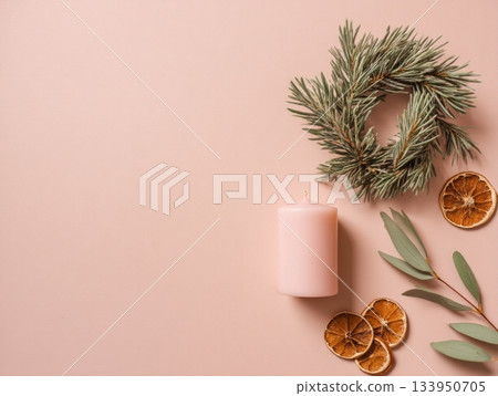 Advent candle and pine wreath on pastel Advent candle and pine wreath on pastel 133950705