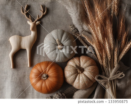Rustic autumn still life with pumpkins and wheat Rustic autumn still life with pumpkins and wheat 133950875