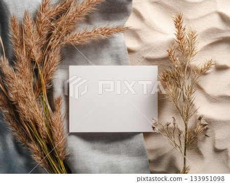 Card Mockup on Linen and Sand with Dried Plants Card Mockup on Linen and Sand with Dried Plants 133951098