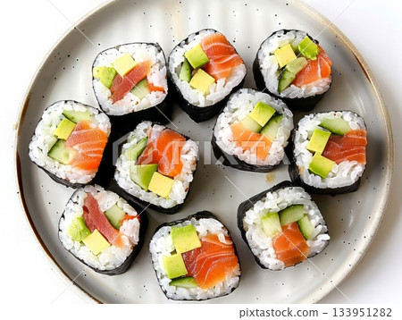 Sushi rolls with salmon, avocado and cucumber 133951282