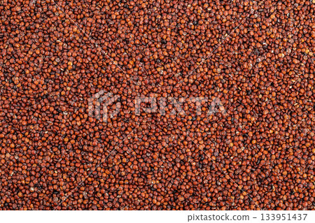red quinoa seeds as a background. Top view. Flat lay 133951437