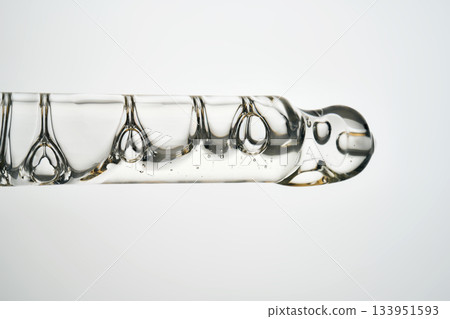 Cosmetic pipette filling with clear serum or oil 133951593