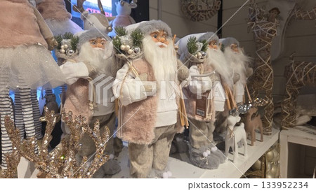 Festive Christmas decor with santa figures and reindeer display for holiday cheer 133952234