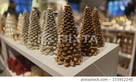 Festive Christmas tree decorations display in warm rustic tones for holiday ambiance 133952240