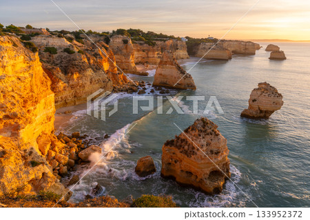 Marinha Beach, Cliffs and Atlantic Ocean in Sunny Morning. Portugal 133952372