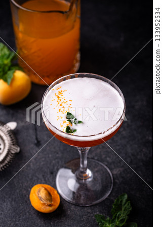 Fresh apricot cocktail martini with mint Fresh apricot cocktail martini with mint 133952534