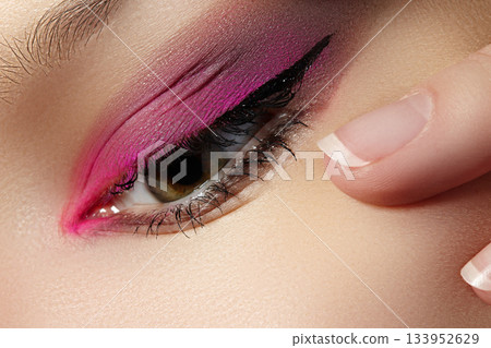 Closeup Macro of Woman Face with Pink Eyes Make-up. Fashion Celebrate Makeup. Beautiful Bright Magenta Make-up Closeup Macro of Woman Face with Pink Eyes Make-up. Fashion Celebrate Makeup. Beautiful Bright Magenta Make-up 133952629