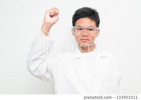 Young Asian Boy Dressed as Scientist with Lab Coat Arm Raised Young Asian Boy Dressed as Scientist with Lab Coat Arm Raised 133953311