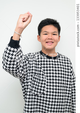 Asian Teenage Boy Studio Portrait on White Background Fist Pump Victory Celebration Gesture Asian Teenage Boy Studio Portrait on White Background Fist Pump Victory Celebration Gesture 133953401